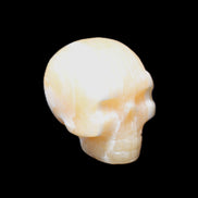 Yellow Calcite skull hand-carved 49*43*34mm 131g in sunlight - Rocks and Things Store