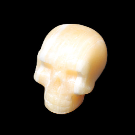 Yellow Calcite skull hand-carved 49*43*34mm 131g in sunlight - Rocks and Things Store