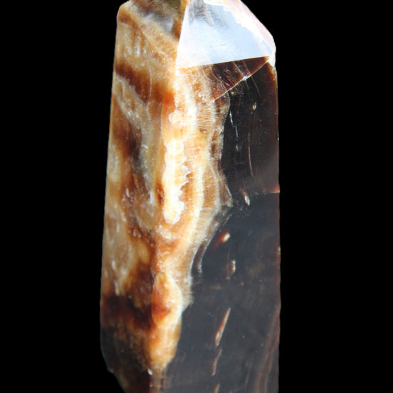 Chocolate Calcite obelisk 111*32mm 215g in UV light - Rocks and Things Store