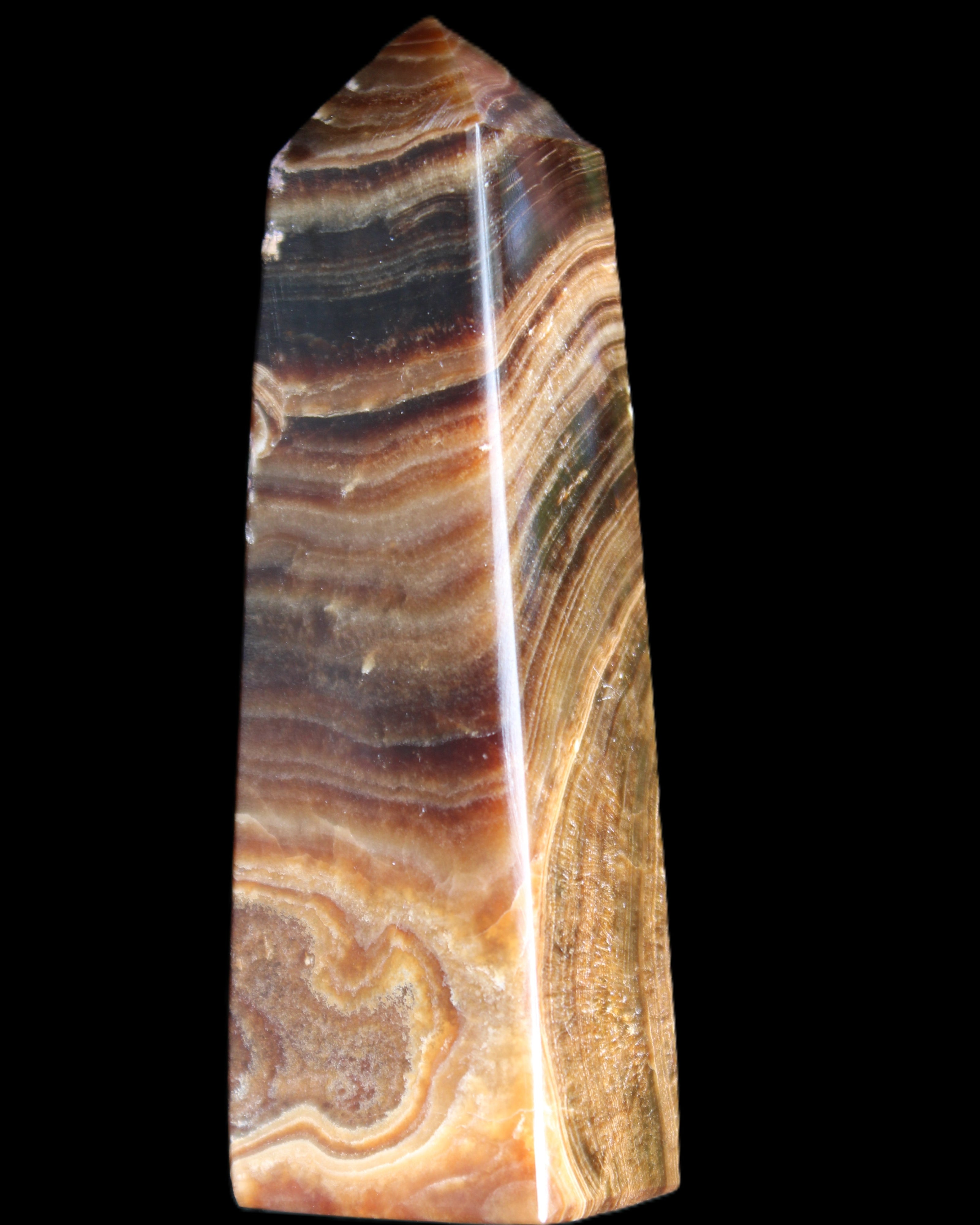 Chocolate Calcite obelisk 112*37mm 230g in UV light - Rocks and Things Store