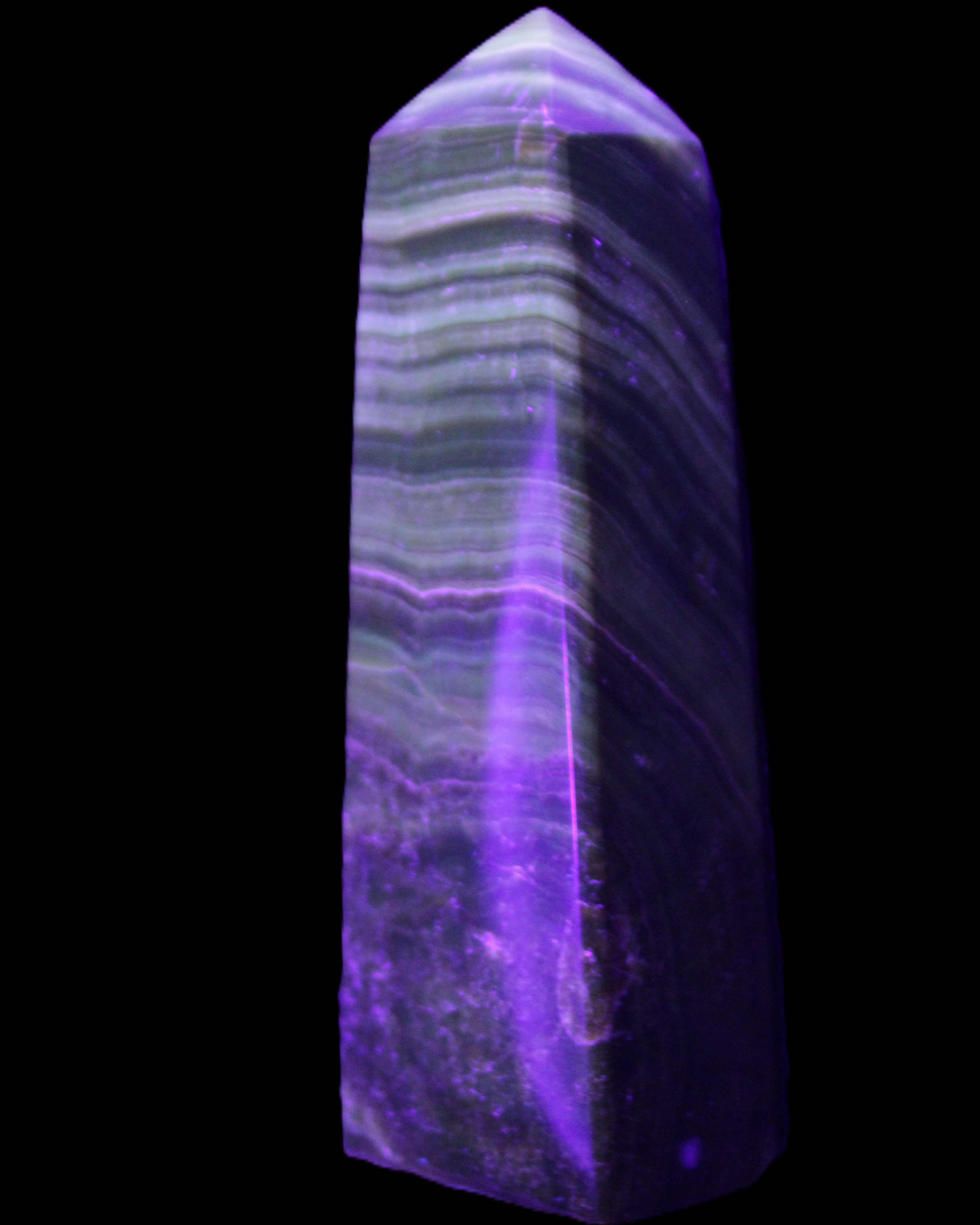 Chocolate Calcite obelisk 112*37mm 230g in UV light - Rocks and Things Store