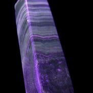 Chocolate Calcite obelisk 112*37mm 230g in UV light - Rocks and Things Store