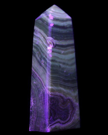 Chocolate Calcite obelisk 112*37mm 230g in UV light - Rocks and Things Store