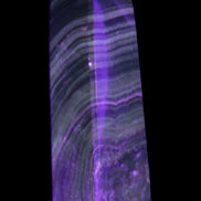 Chocolate Calcite obelisk 112*37mm 230g in UV light - Rocks and Things Store