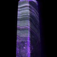 Chocolate Calcite obelisk 112*37mm 230g in UV light - Rocks and Things Store