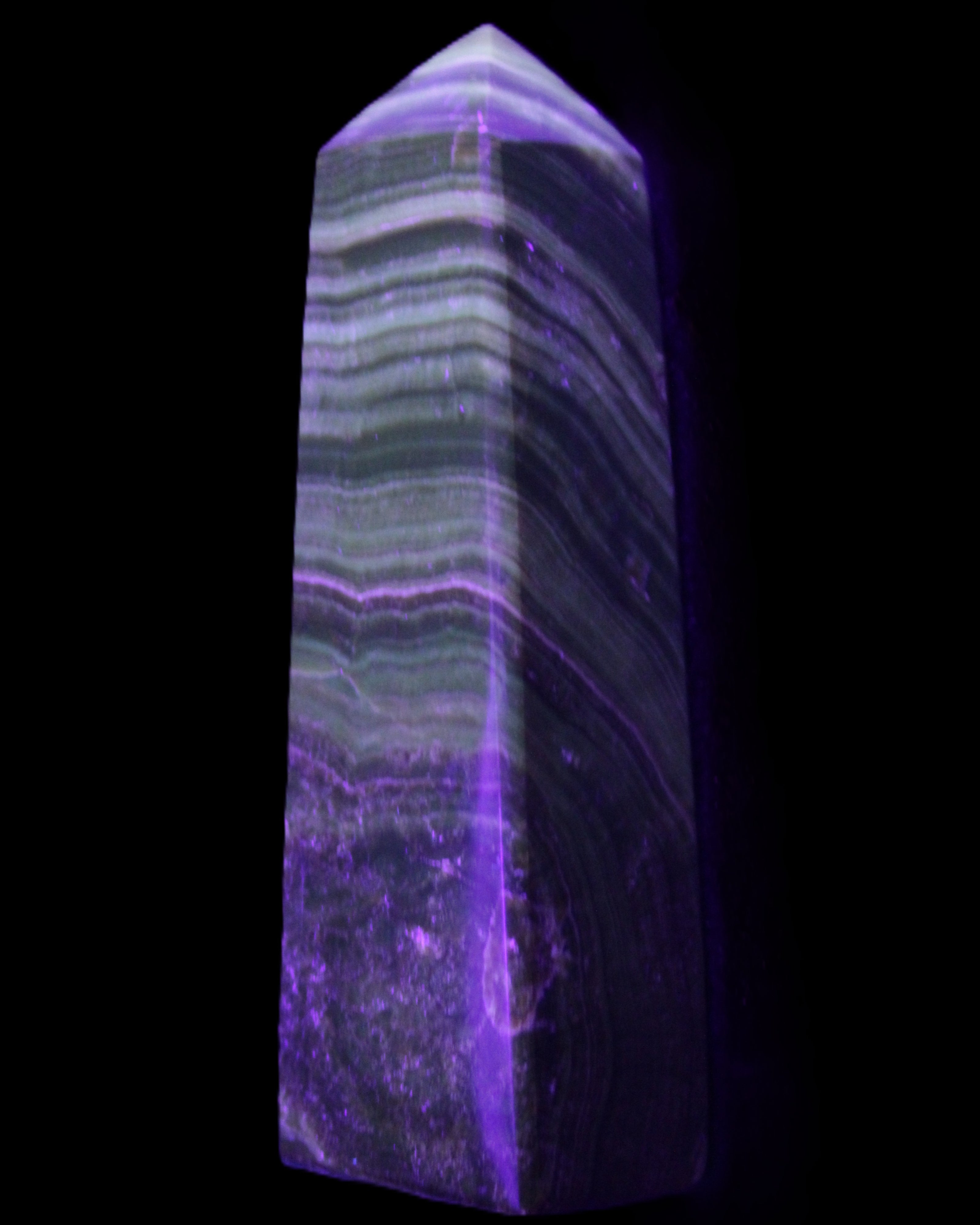 Chocolate Calcite obelisk 112*37mm 230g in UV light - Rocks and Things Store