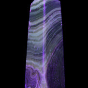 Chocolate Calcite obelisk 112*37mm 230g in UV light - Rocks and Things Store
