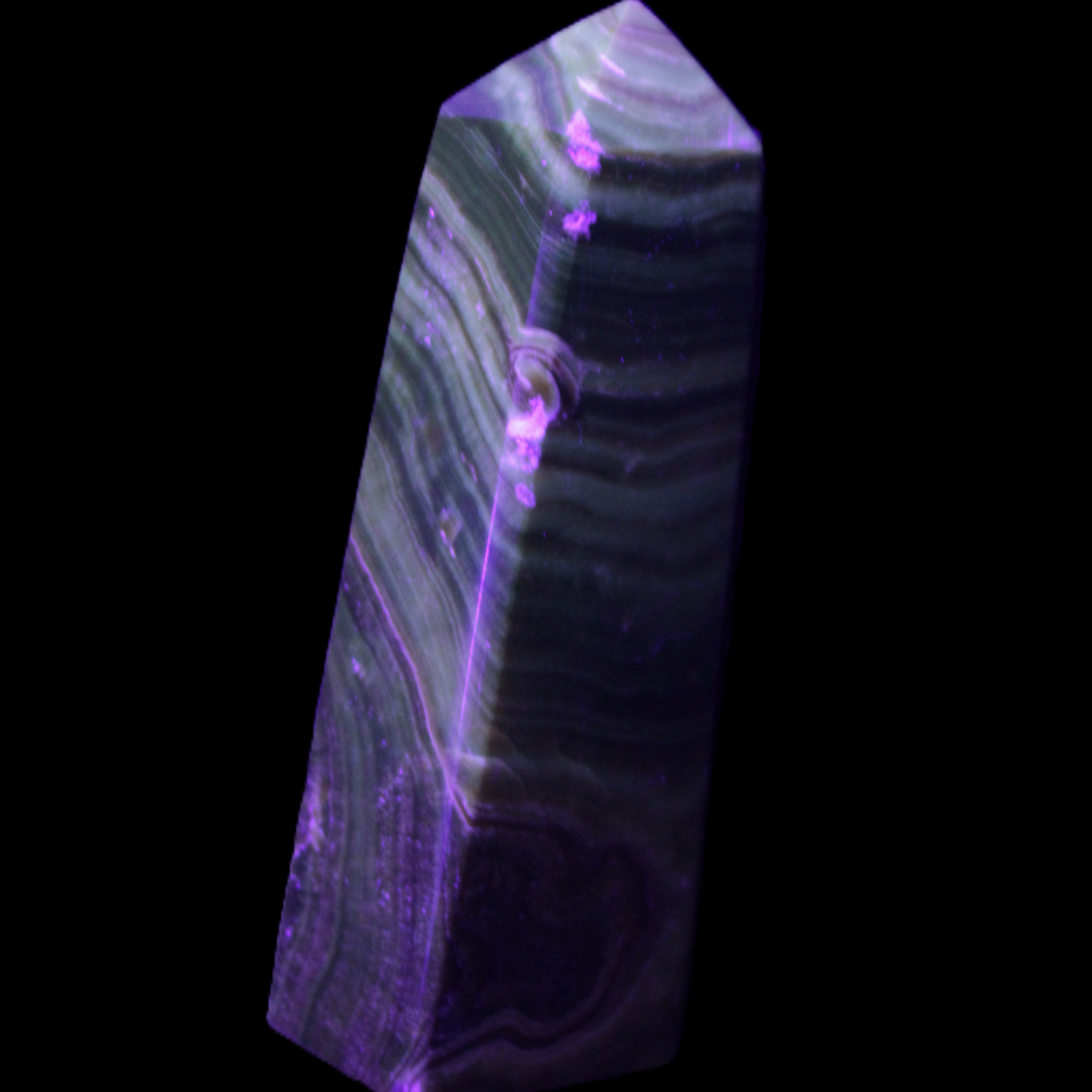 Chocolate Calcite obelisk 112*37mm 230g in UV light - Rocks and Things Store