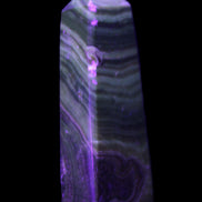 Chocolate Calcite obelisk 112*37mm 230g in UV light - Rocks and Things Store