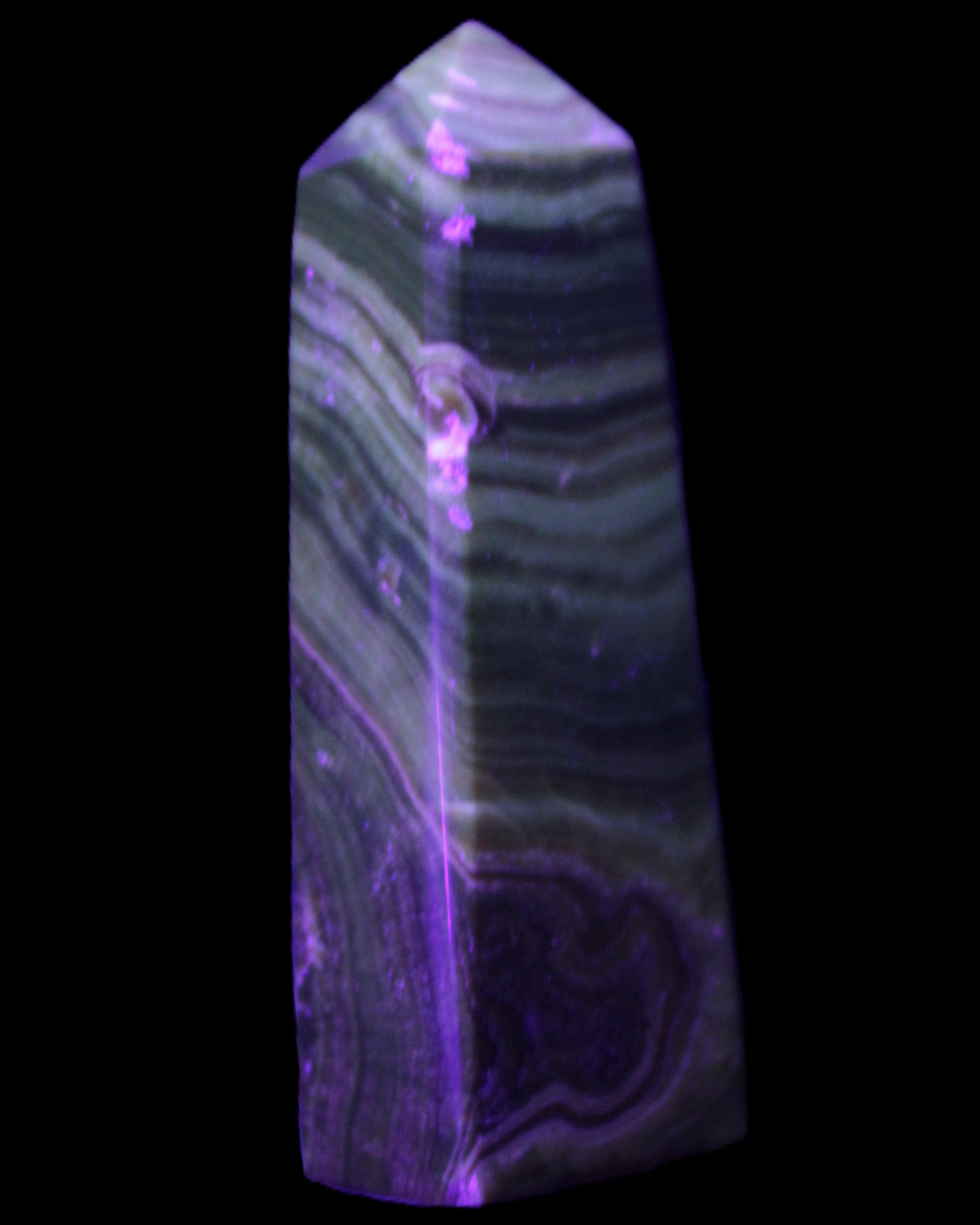 Chocolate Calcite obelisk 112*37mm 230g in UV light - Rocks and Things Store