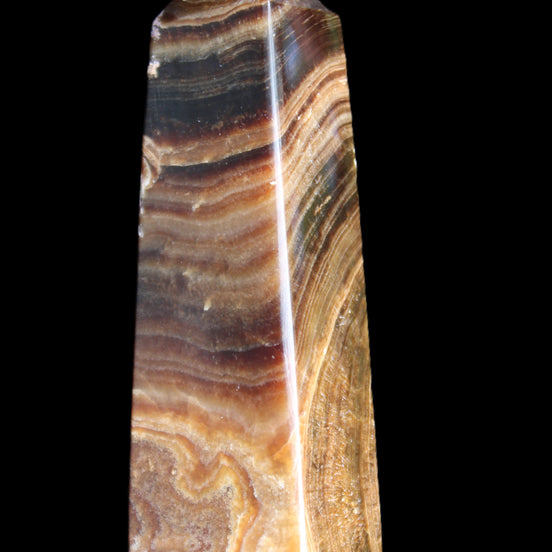 Chocolate Calcite obelisk 112*37mm 230g in UV light - Rocks and Things Store