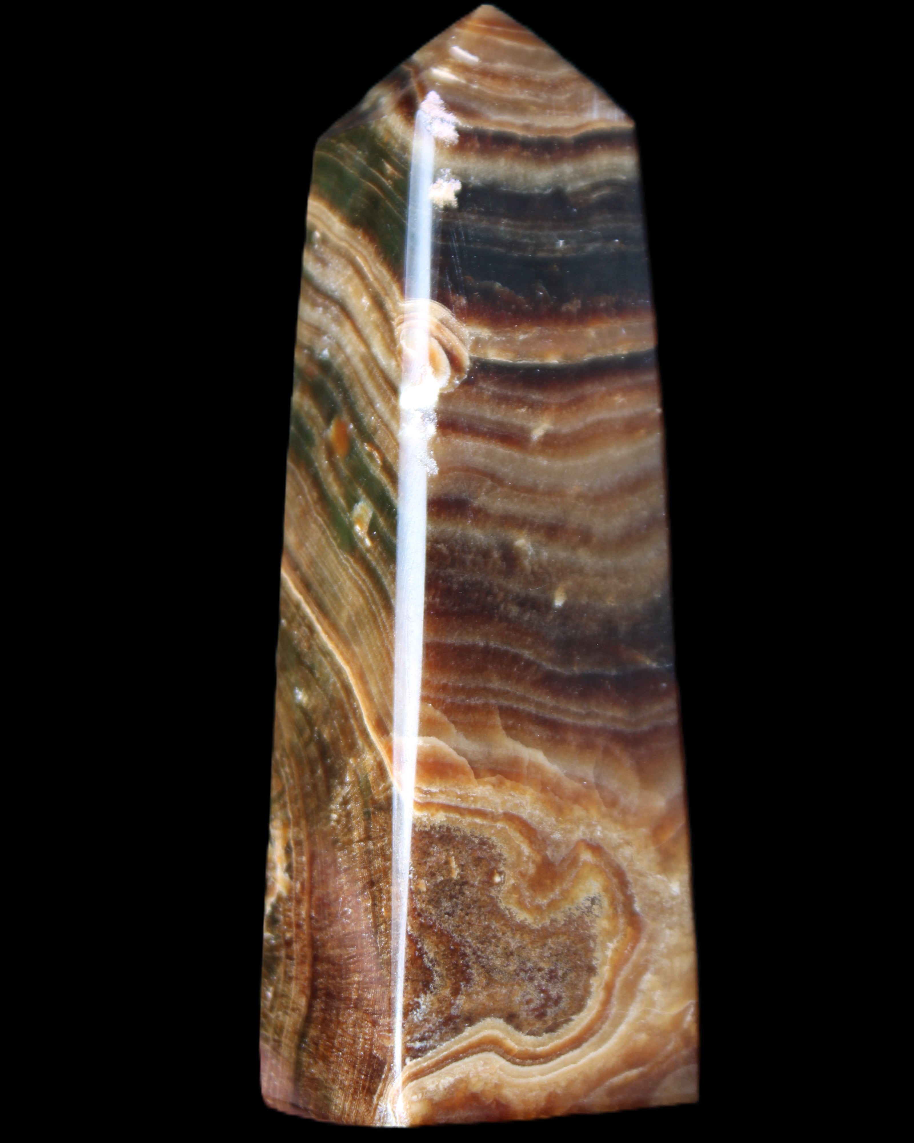 Chocolate Calcite obelisk 112*37mm 230g in UV light - Rocks and Things Store