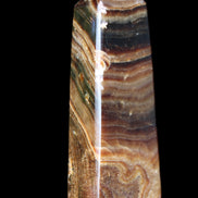 Chocolate Calcite obelisk 112*37mm 230g in UV light - Rocks and Things Store