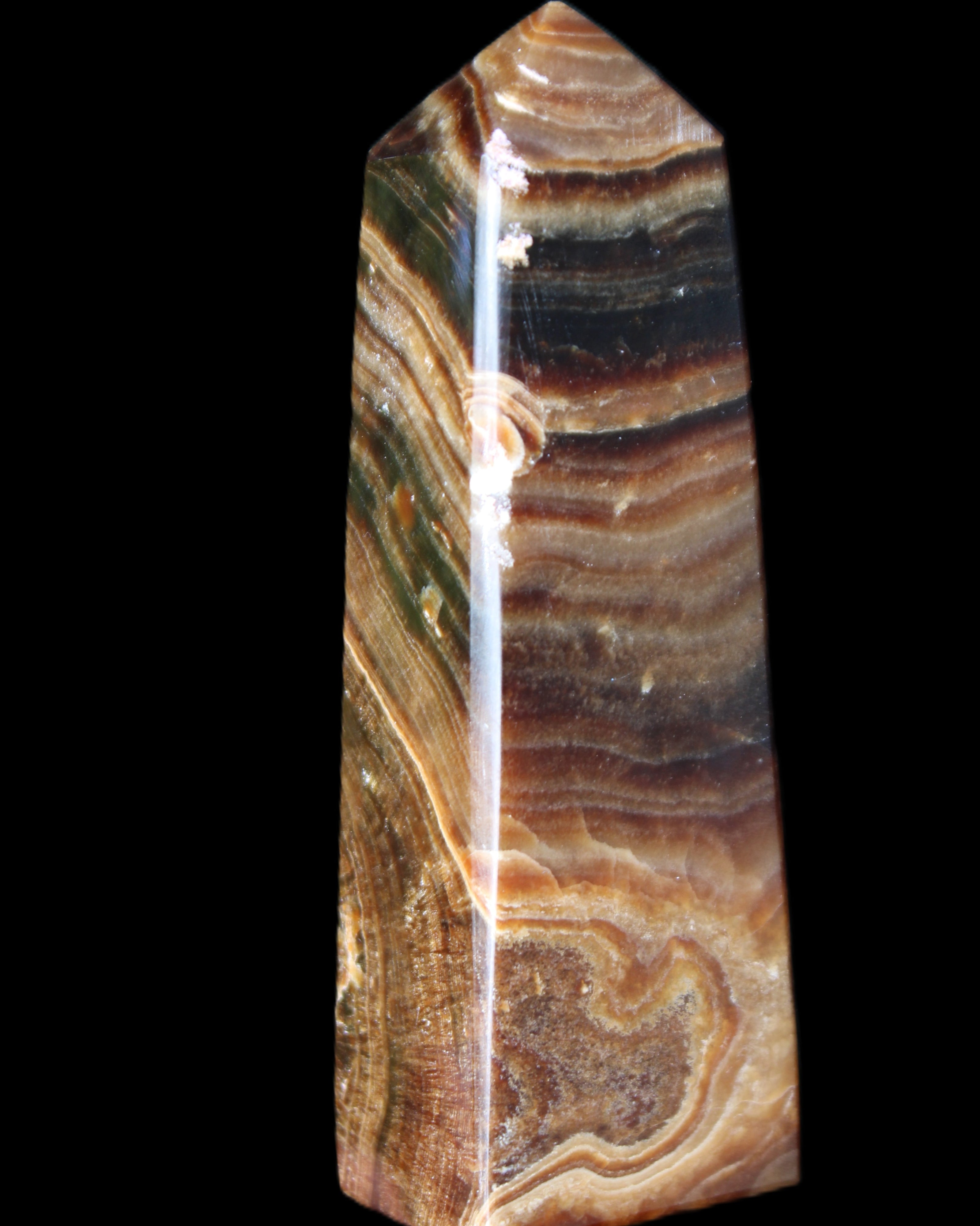 Chocolate Calcite obelisk 112*37mm 230g in UV light - Rocks and Things Store
