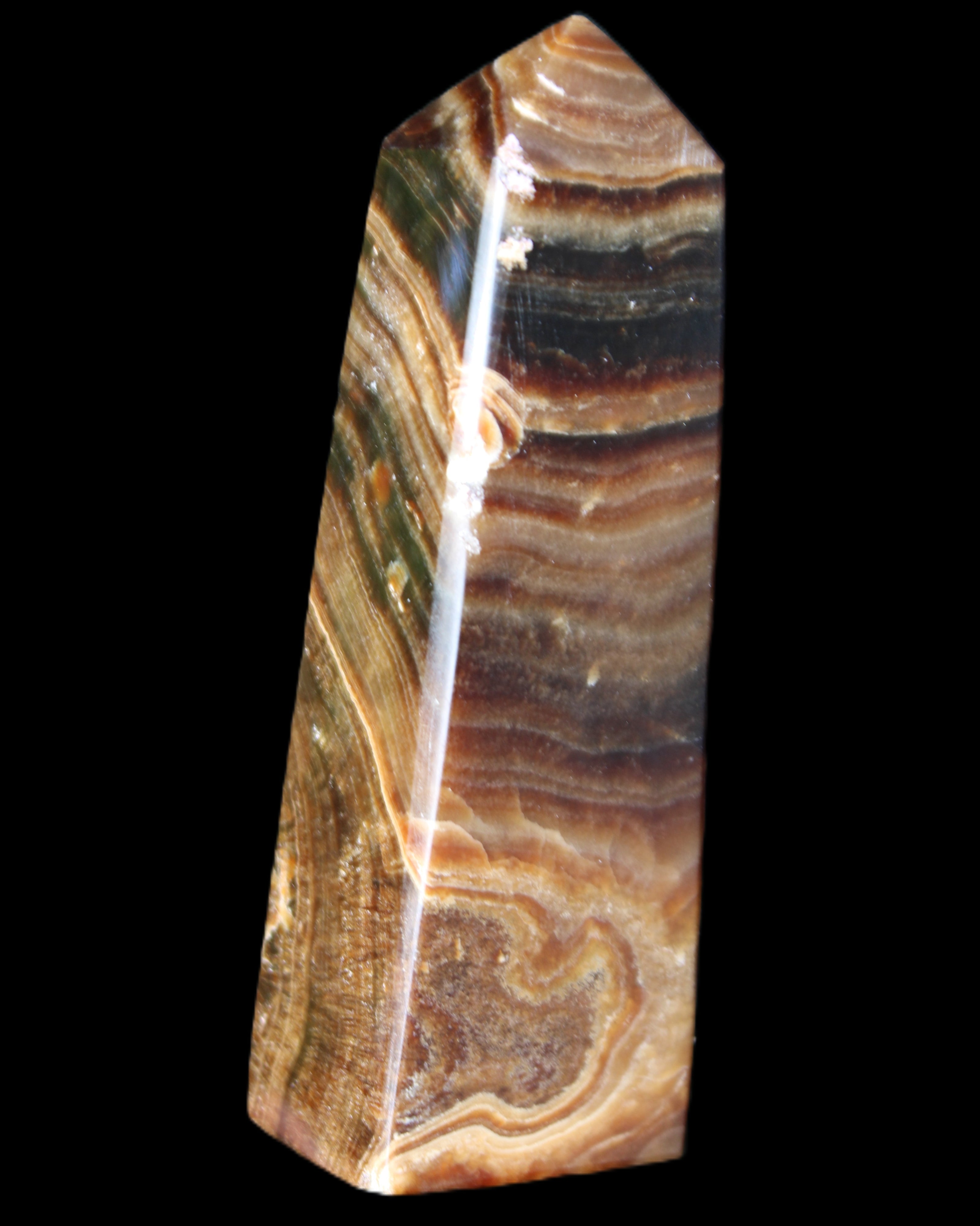 Chocolate Calcite obelisk 112*37mm 230g in UV light - Rocks and Things Store