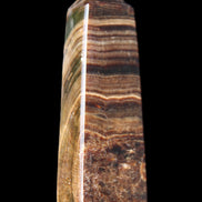 Chocolate Calcite obelisk 112*37mm 230g in UV light - Rocks and Things Store