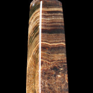 Chocolate Calcite obelisk 112*37mm 230g in UV light - Rocks and Things Store