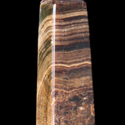 Chocolate Calcite obelisk 112*37mm 230g in UV light - Rocks and Things Store
