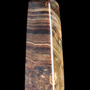 Chocolate Calcite obelisk 112*37mm 230g in UV light - Rocks and Things Store