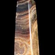 Chocolate Calcite obelisk 112*37mm 230g in UV light - Rocks and Things Store