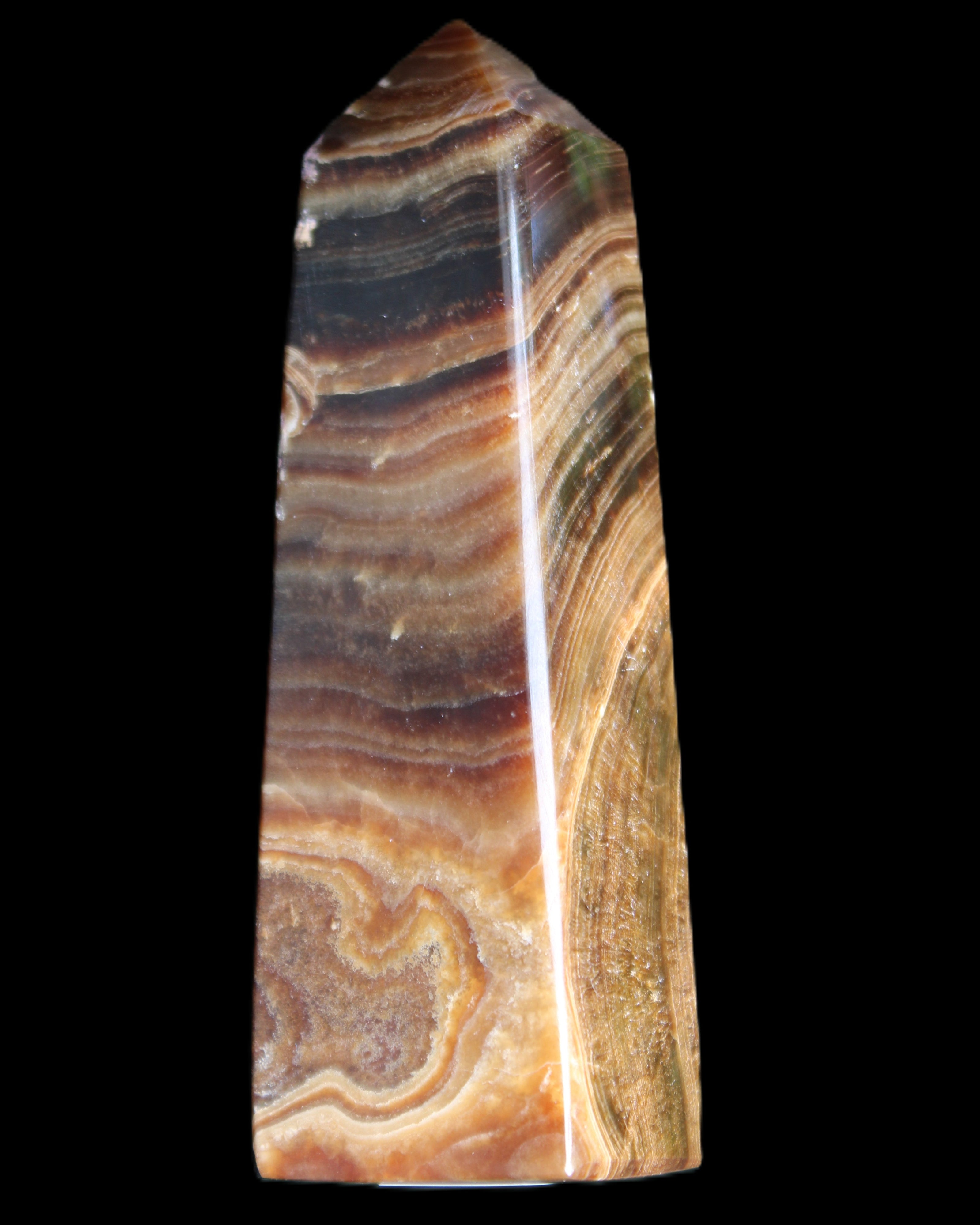 Chocolate Calcite obelisk 112*37mm 230g in UV light - Rocks and Things Store
