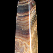 Chocolate Calcite obelisk 112*37mm 230g in UV light - Rocks and Things Store