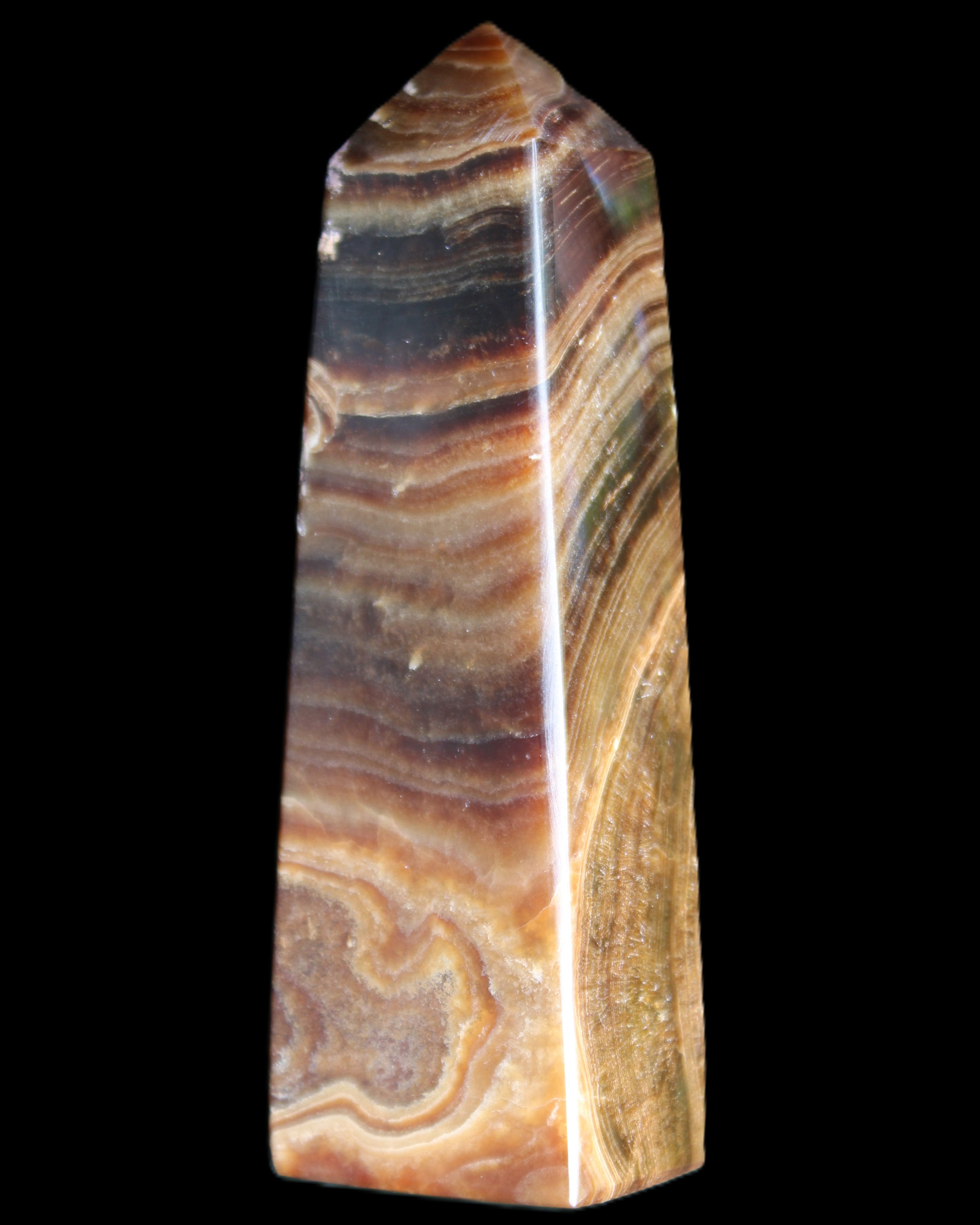 Chocolate Calcite obelisk 112*37mm 230g in UV light - Rocks and Things Store