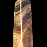 Chocolate Calcite obelisk 112*37mm 230g in UV light - Rocks and Things Store