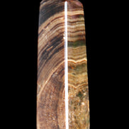 Chocolate Calcite obelisk 112*37mm 230g in UV light - Rocks and Things Store