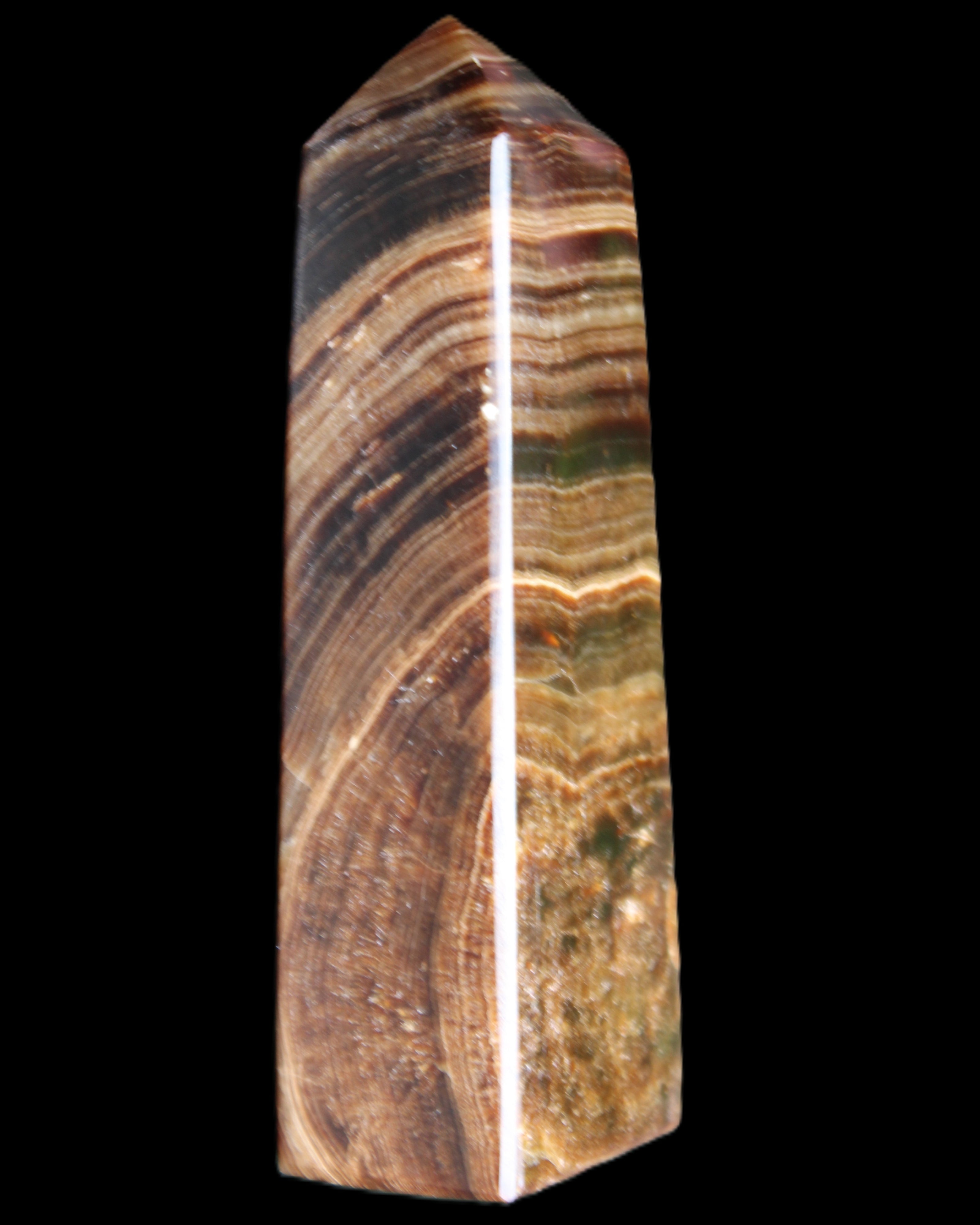 Chocolate Calcite obelisk 112*37mm 230g in UV light - Rocks and Things Store