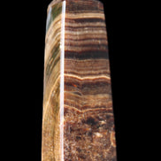 Chocolate Calcite obelisk 112*37mm 230g in UV light - Rocks and Things Store