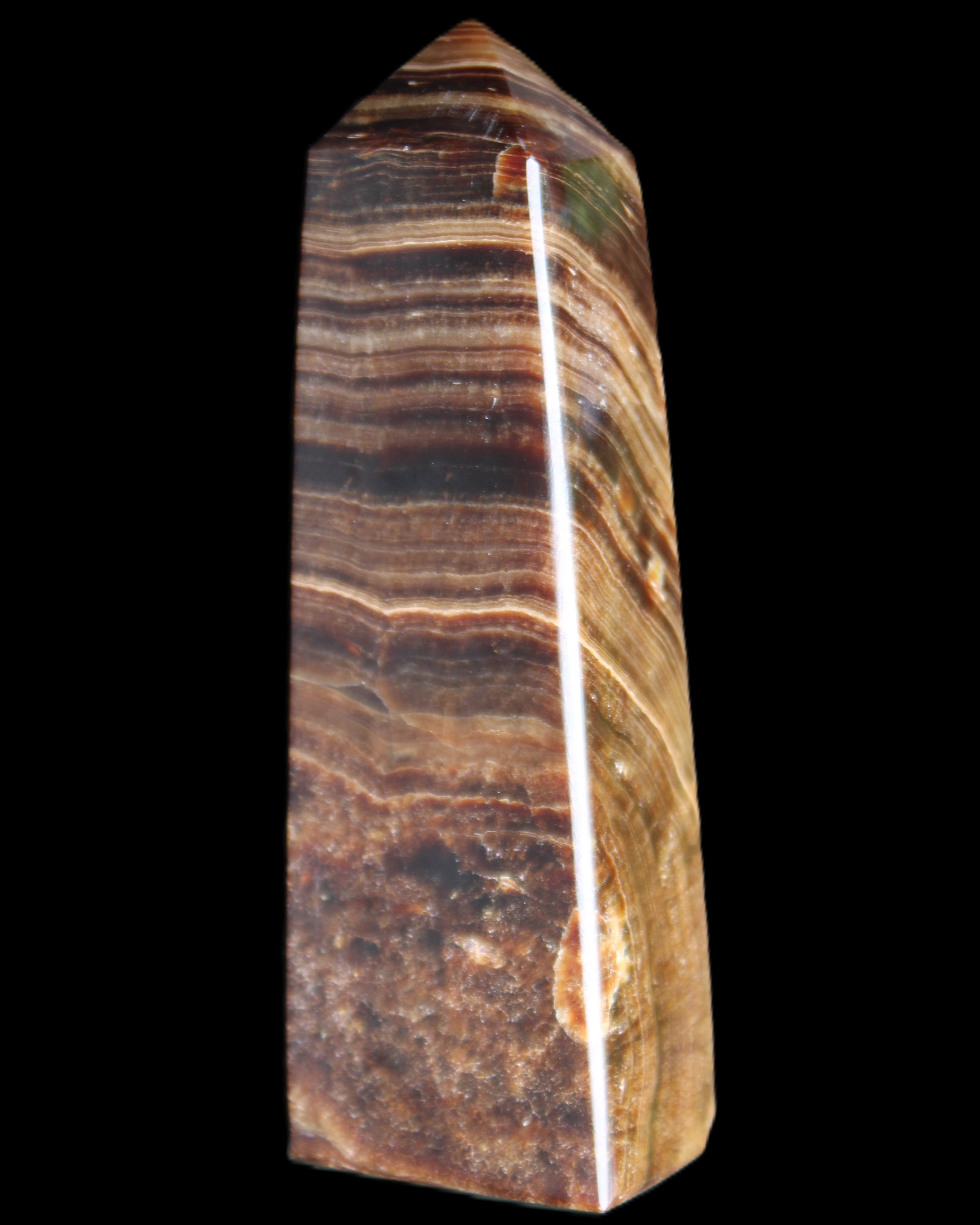 Chocolate Calcite obelisk 112*37mm 230g in UV light - Rocks and Things Store