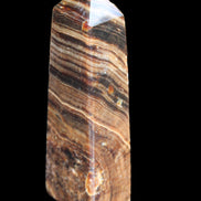 Chocolate Calcite obelisk 112*37mm 230g in UV light - Rocks and Things Store