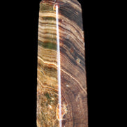 Chocolate Calcite obelisk 112*37mm 230g in UV light - Rocks and Things Store