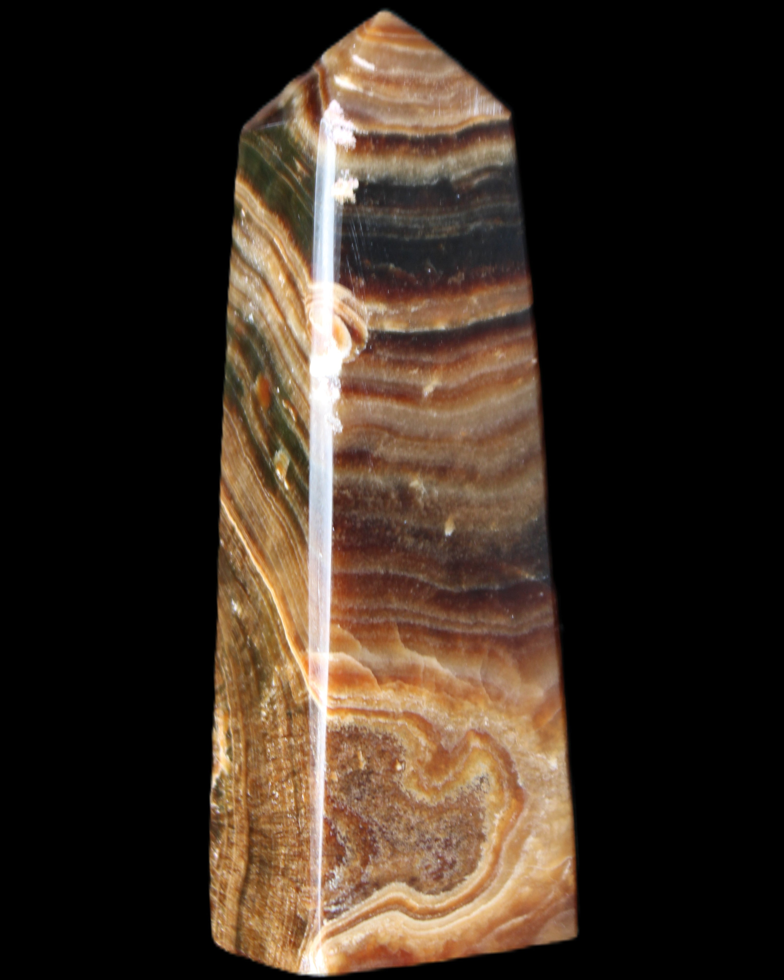 Chocolate Calcite obelisk 112*37mm 230g in UV light - Rocks and Things Store