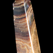 Chocolate Calcite obelisk 112*37mm 230g in UV light - Rocks and Things Store
