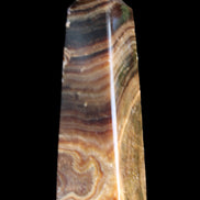 Chocolate Calcite obelisk 112*37mm 230g in UV light - Rocks and Things Store
