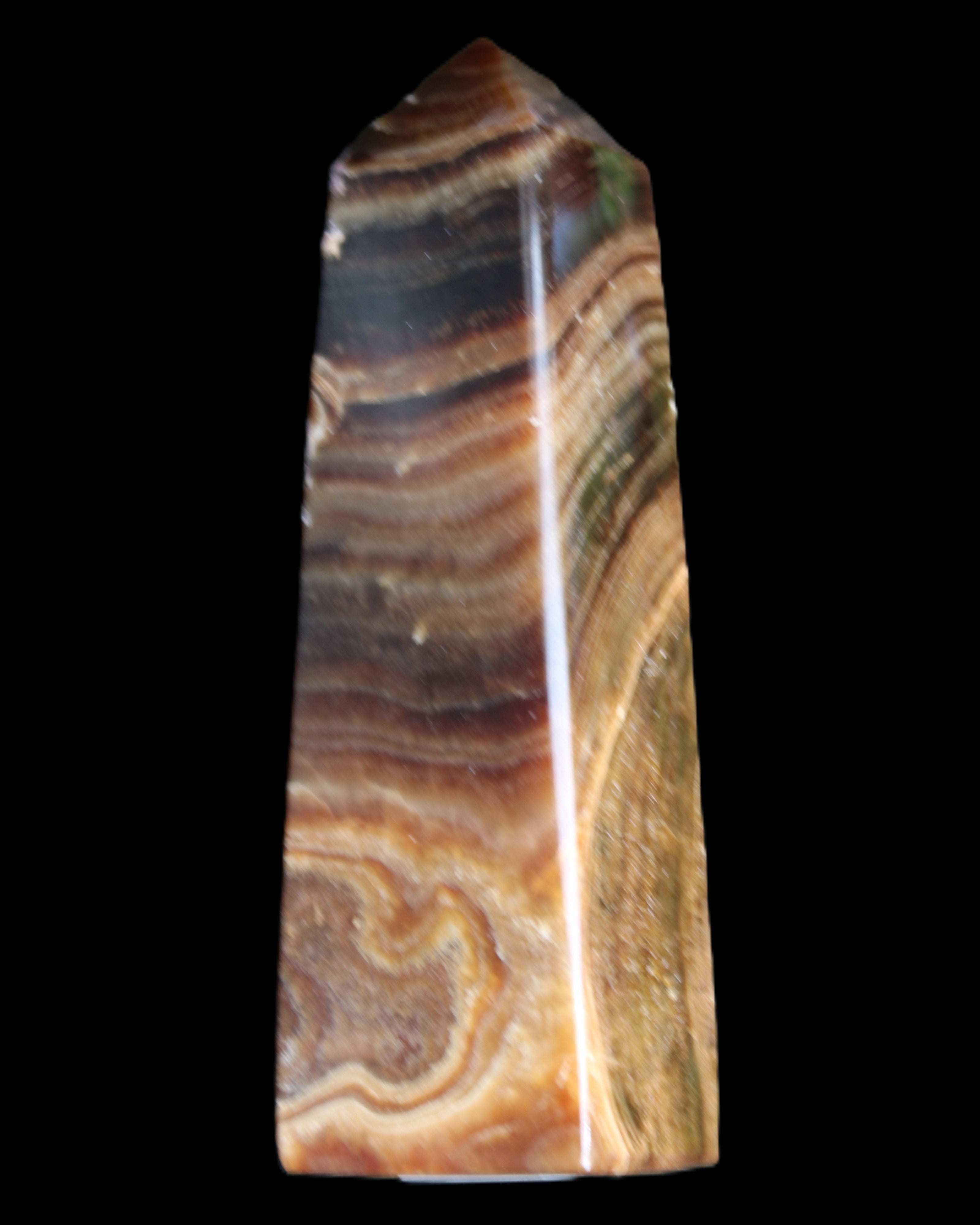 Chocolate Calcite obelisk 112*37mm 230g in UV light - Rocks and Things Store