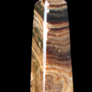 Chocolate Calcite obelisk 112*37mm 230g in UV light - Rocks and Things Store