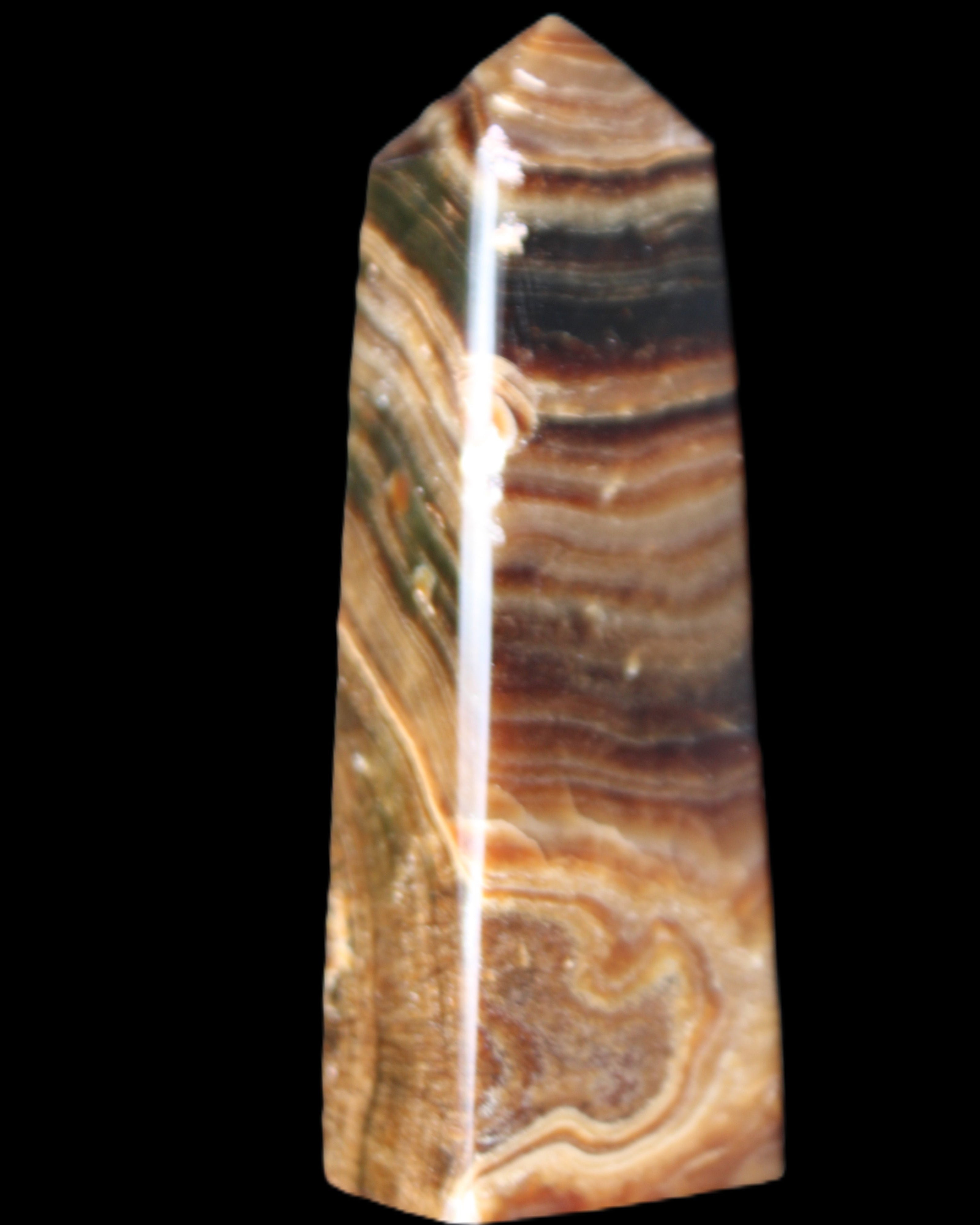 Chocolate Calcite obelisk 112*37mm 230g in UV light - Rocks and Things Store