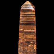 Chocolate Calcite obelisk 112*37mm 230g in UV light - Rocks and Things Store