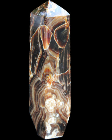 Tall Chocolate Calcite obelisk 154*32mm 439g in UV light - Rocks and Things Store