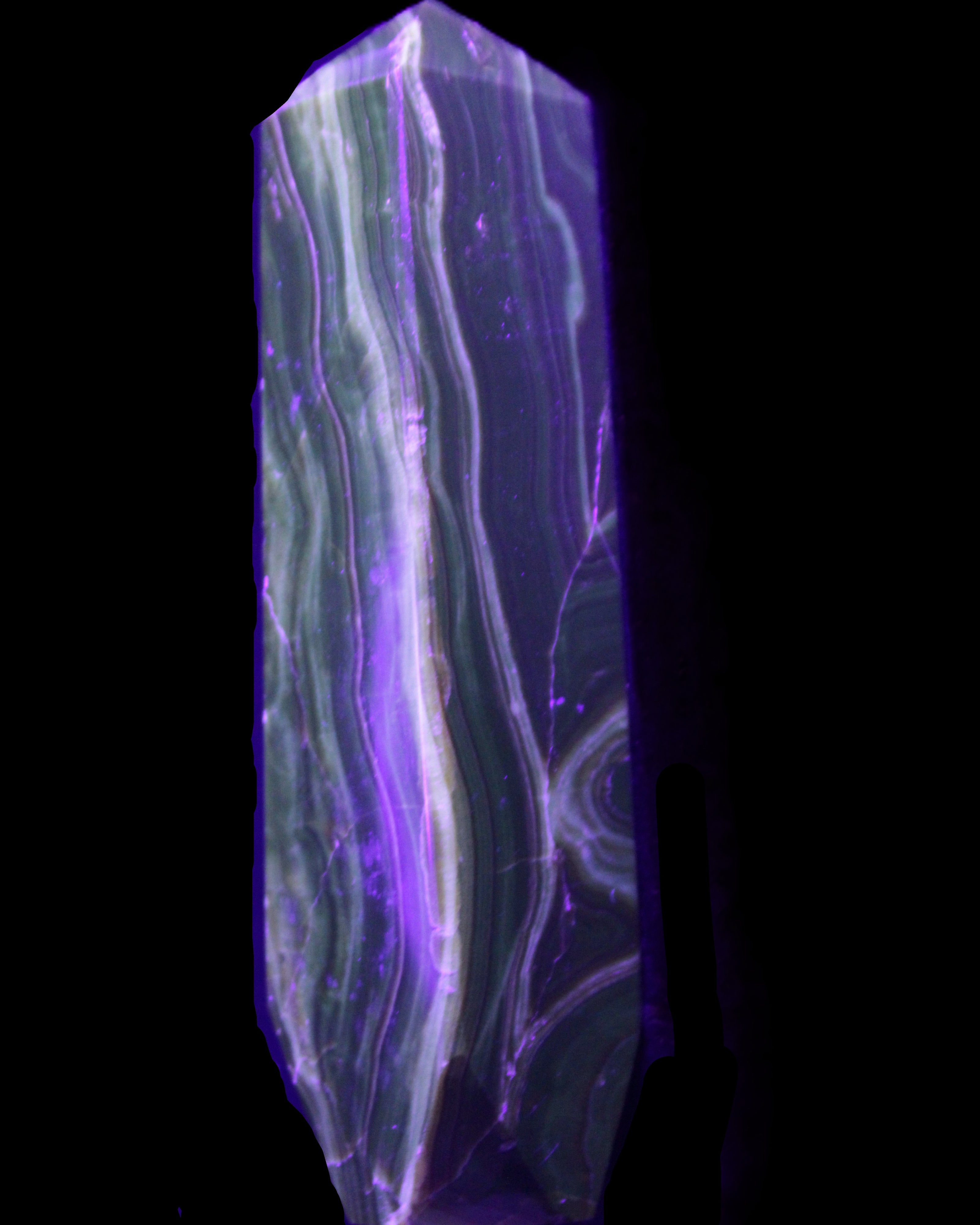 Tall Chocolate Calcite obelisk 154*32mm 439g in UV light - Rocks and Things Store