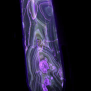 Tall Chocolate Calcite obelisk 154*32mm 439g in UV light - Rocks and Things Store