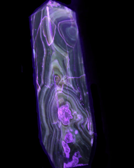 Tall Chocolate Calcite obelisk 154*32mm 439g in UV light - Rocks and Things Store