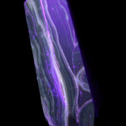 Tall Chocolate Calcite obelisk 154*32mm 439g in UV light - Rocks and Things Store