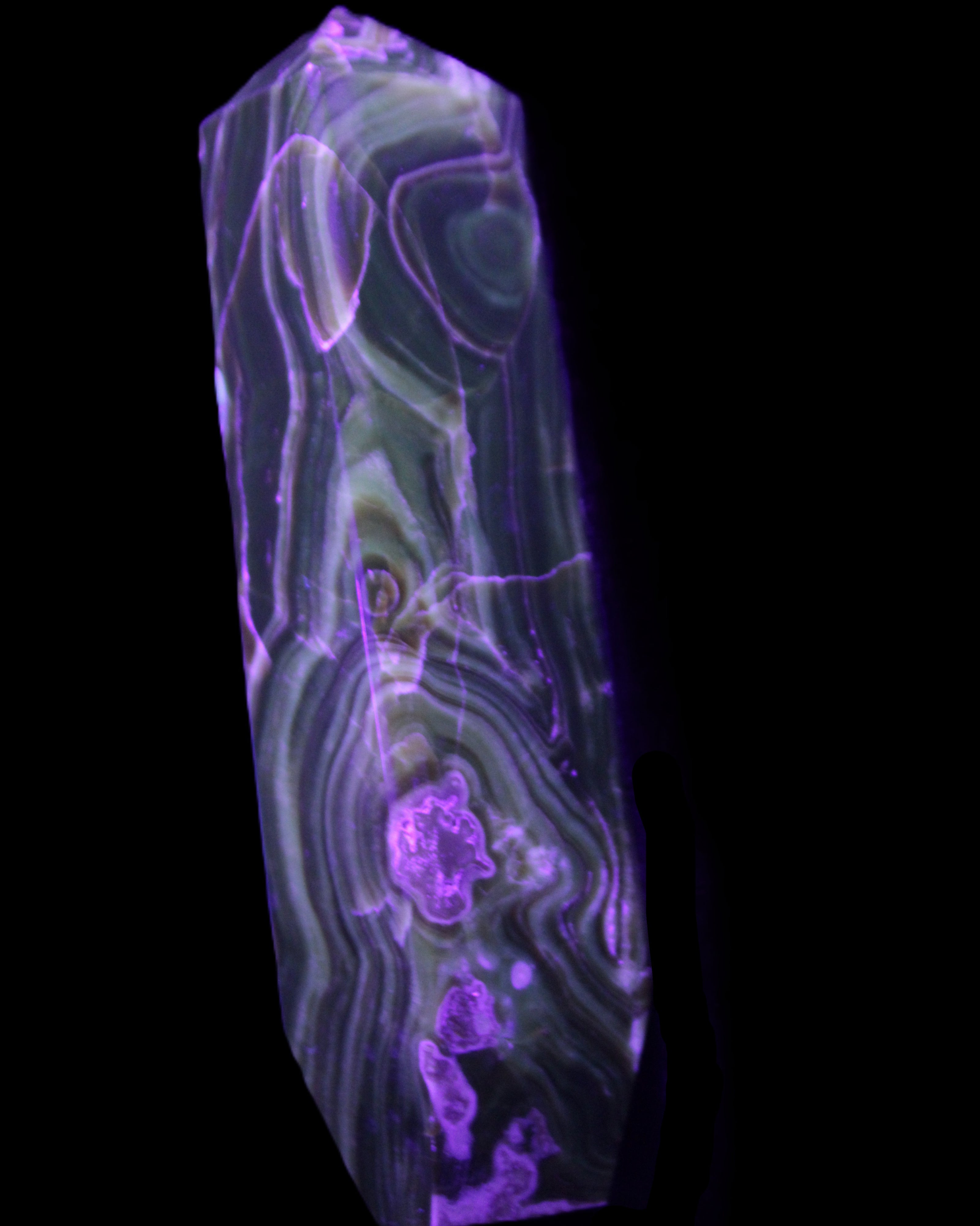 Tall Chocolate Calcite obelisk 154*32mm 439g in UV light - Rocks and Things Store