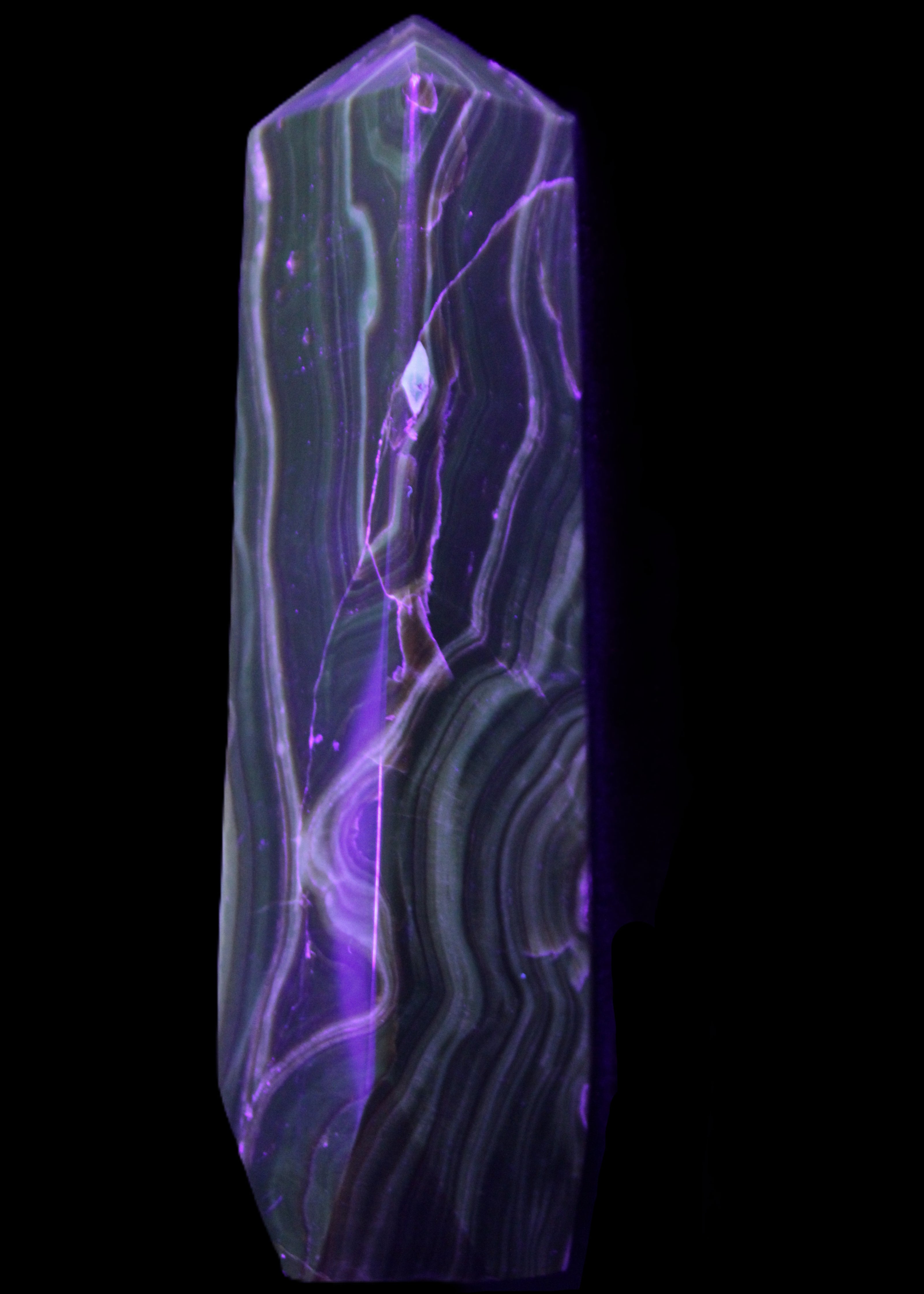 Tall Chocolate Calcite obelisk 154*32mm 439g in UV light - Rocks and Things Store