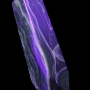 Tall Chocolate Calcite obelisk 154*32mm 439g in UV light - Rocks and Things Store