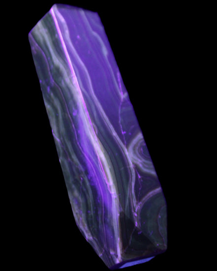 Tall Chocolate Calcite obelisk 154*32mm 439g in UV light - Rocks and Things Store